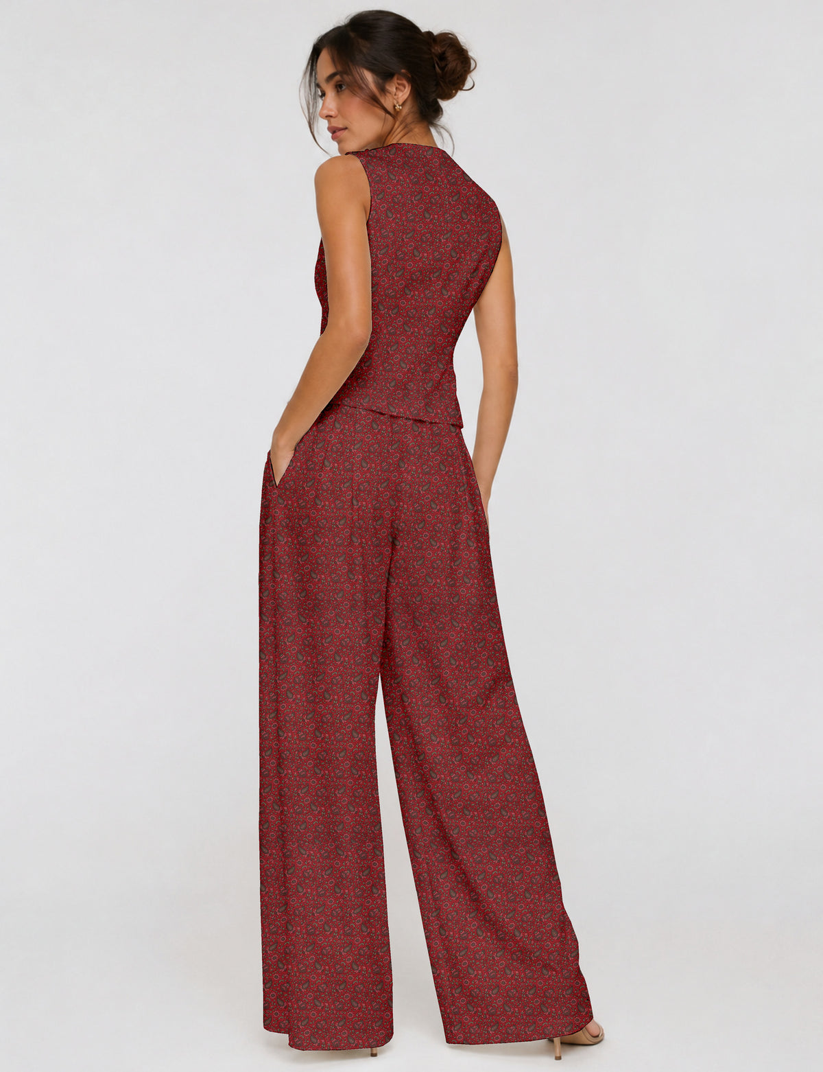 Women's tailored waistcoat set with a sleeveless V-neck button-front waistcoat and high-rise wide leg trousers in a coordinated matching outfit.