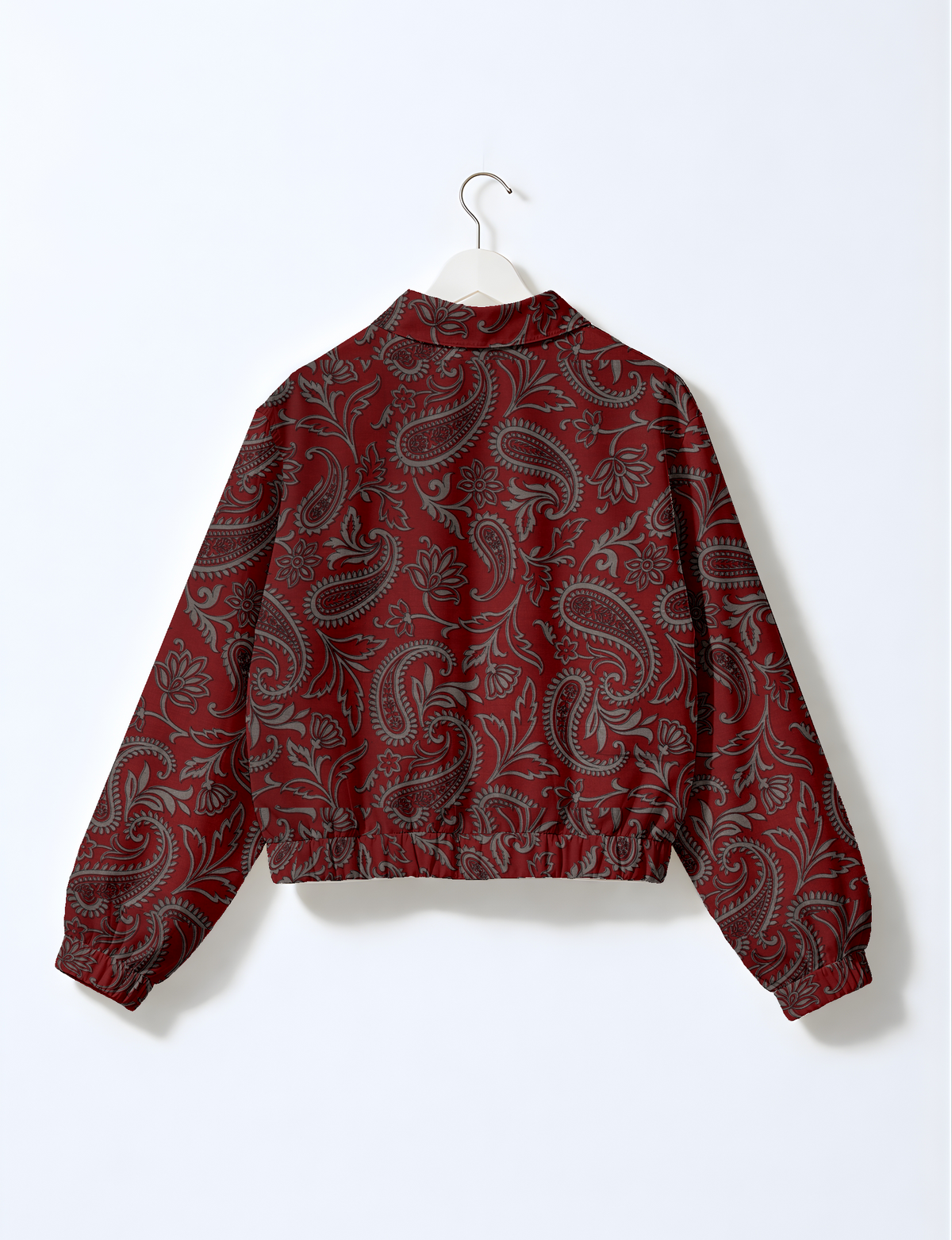 Upcycled Bomber Jacket made from recycled sari materials, featuring a cute cropped shape, elasticated hem and cuffs, and contrast sari print lining. Sustainable apparel promoting eco-friendly fashion and ethical clothing.