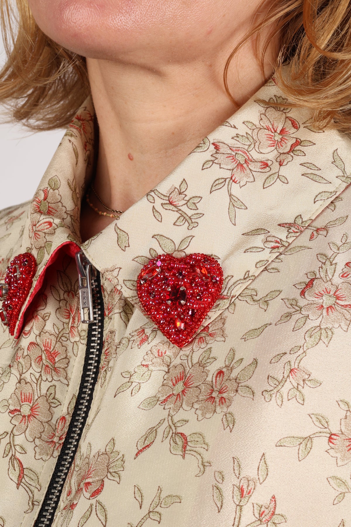 Love Bomber Jacket made from recycled fabric, featuring hand-stitched Aari embroidery. A unique piece of zero-waste clothing, part of the circular fashion movement. Designed with upcycled materials for a stylish yet environmentally friendly clothing choice.