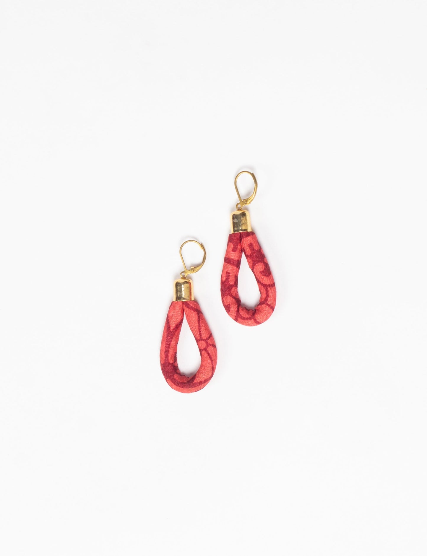 Elevate your style sustainably with our Rope Earrings. Crafted from cotton rope hand-wrapped with pre-loved saris, these earrings are a testament to ethical and green fashion. Make a conscious choice for a brighter, eco-friendly future.