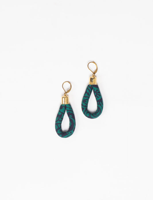 Elevate your style sustainably with our Rope Earrings. Crafted from cotton rope hand-wrapped with pre-loved saris, these earrings are a testament to ethical and green fashion. Make a conscious choice for a brighter, eco-friendly future.