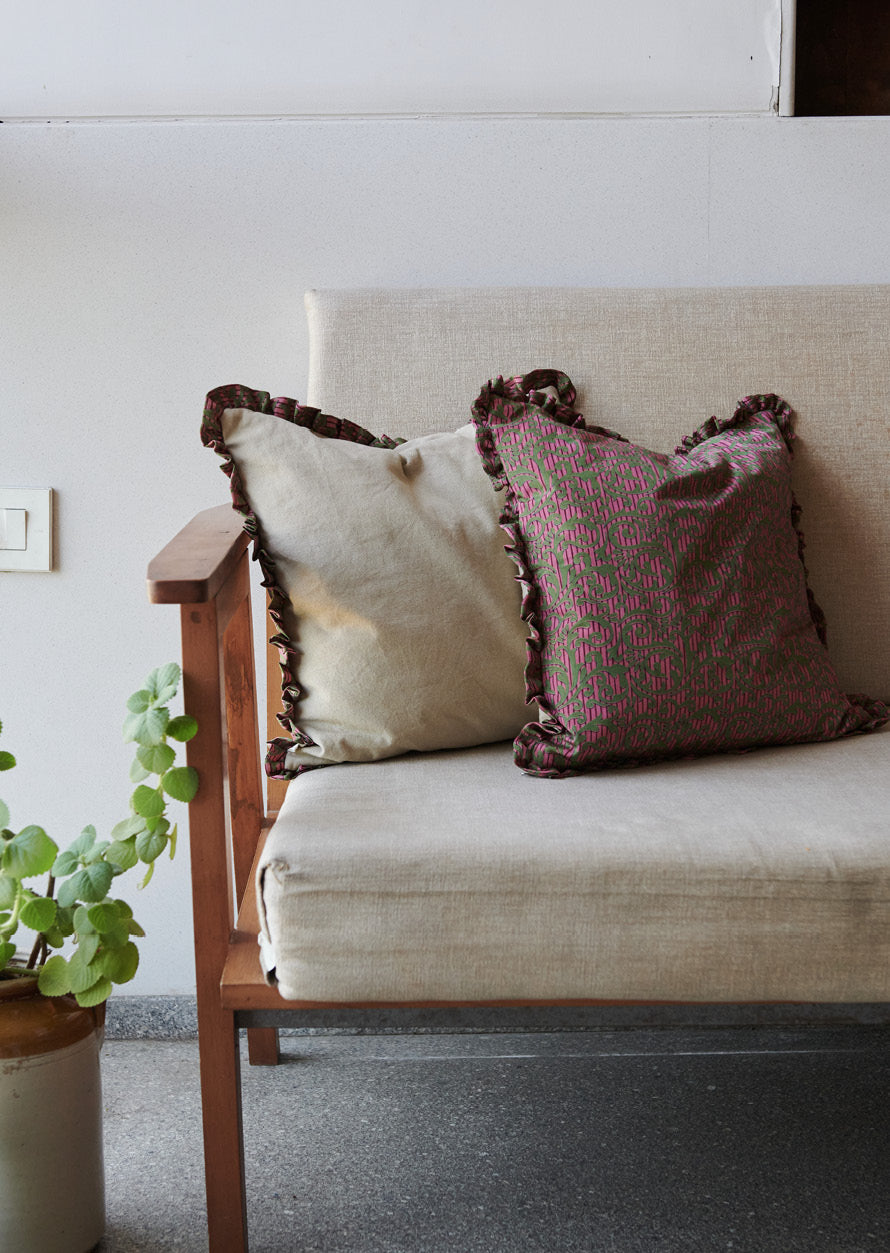 Single Frill Cushion Cover Set of 2 featuring a durable beige canvas on one side and vibrant upcycled sari fabric on the other, accented with charming frills made from the same sari fabric. Perfect for those embracing upcycled women's clothing, circular fashion, and environment-friendly textiles in home decor.