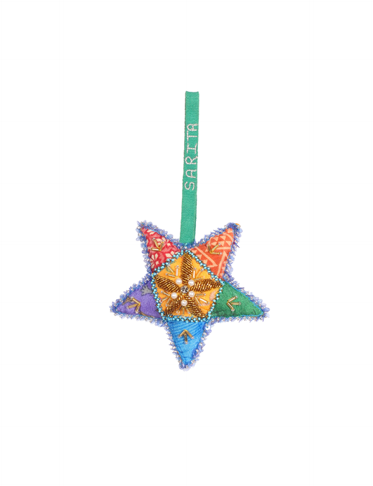 Colorful star-shaped Artisans Christmas Ornament made from upcycled fabric, symbolizing joy and hope. A sustainable fashion item promoting eco-friendly, zero-waste clothing and ethical fashion practices.