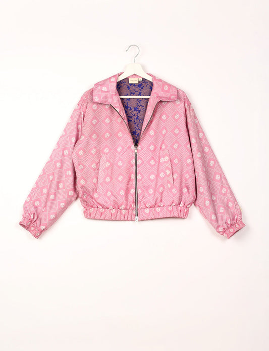 Stylish BOMBER JACKET, an upcycled clothing masterpiece with a cute cropped shape, elasticated details, and detachable metallic zipper. Contrast sari print lining adds a unique touch. Explore sustainable and eco-friendly fashion.