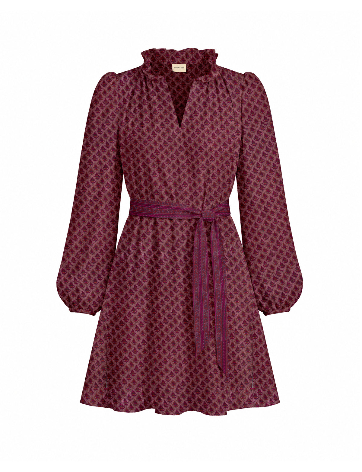 Pink swing dress with long puff sleeves, ruffled collar, V-neck, all-over leaf pattern, and matching fabric belt, front view