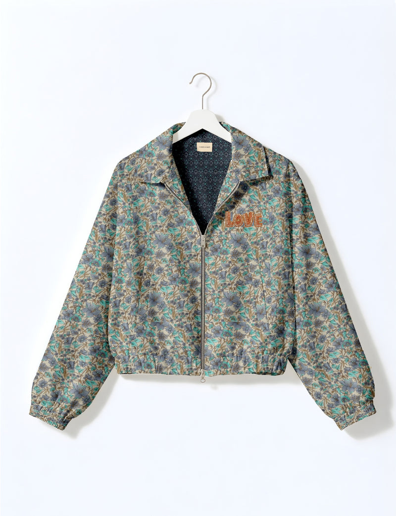 Love Bomber Jacket made from recycled fabric, featuring hand-stitched Aari embroidery. A unique piece of zero-waste clothing, part of the circular fashion movement. Designed with upcycled materials for a stylish yet environmentally friendly clothing choice.