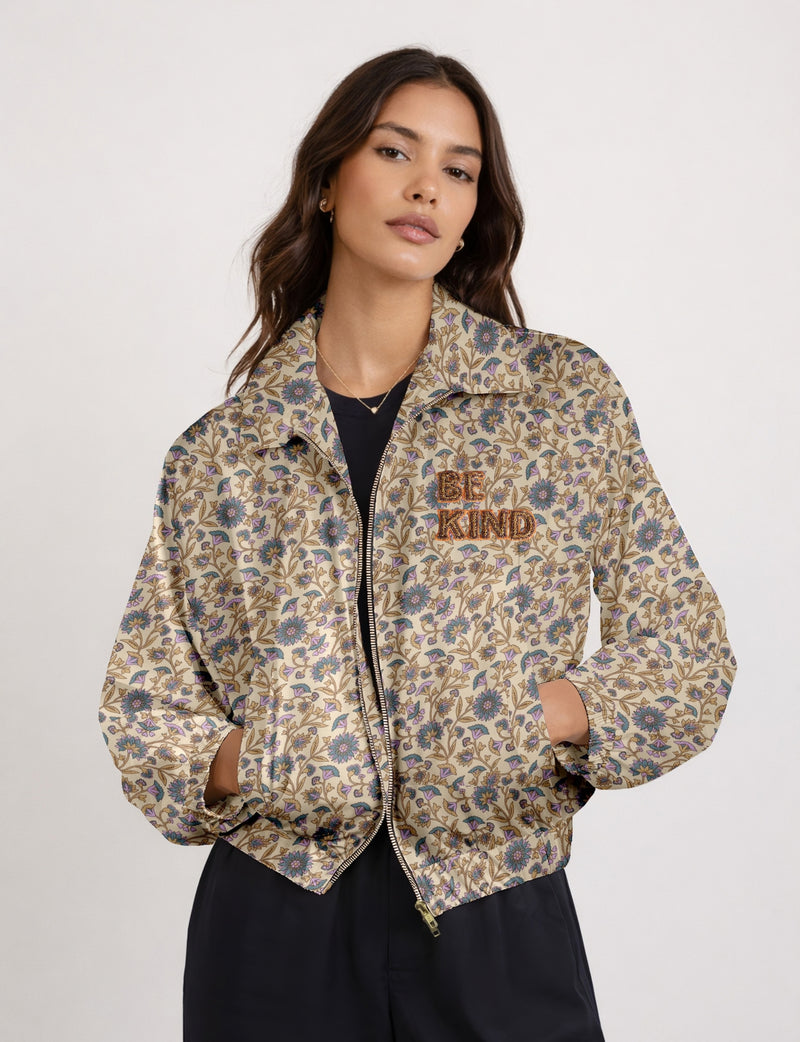 BE KIND Bomber jacket made from upcycled sari fabric with handcrafted Aari embroidery by female artisans.