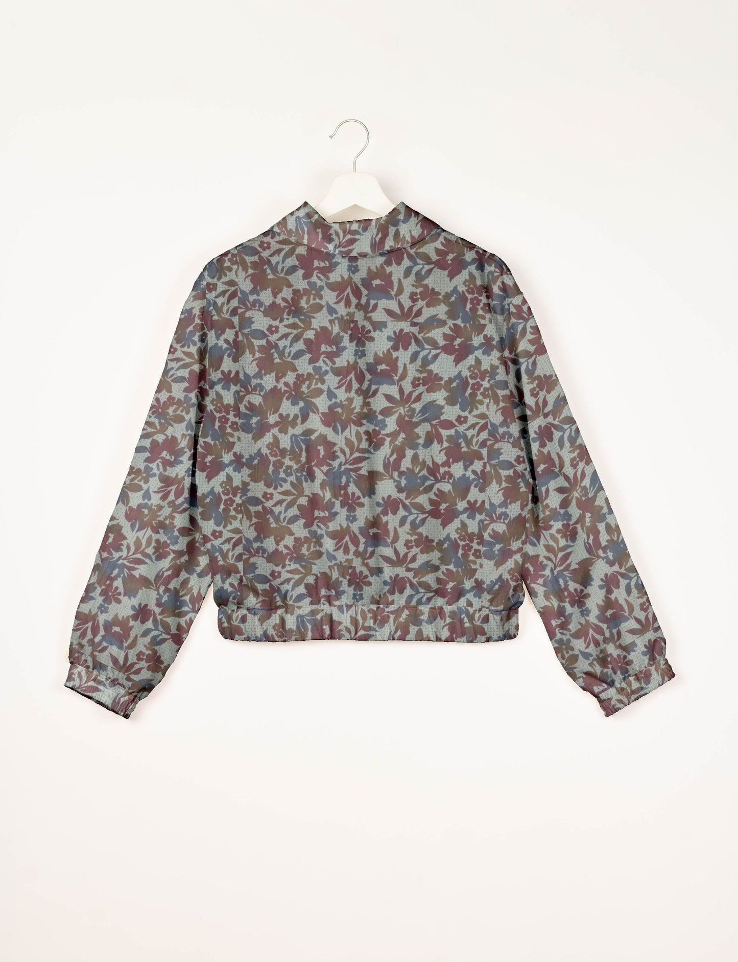 Upcycled Bomber Jacket made from recycled sari materials, featuring a cute cropped shape, elasticated hem and cuffs, and contrast sari print lining. Sustainable apparel promoting eco-friendly fashion and ethical clothing.