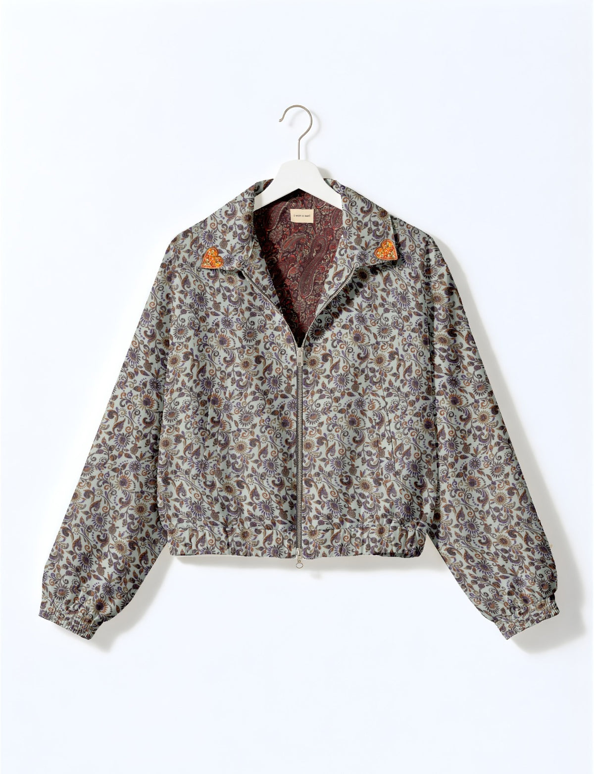 Love Bomber Jacket made from recycled fabric, featuring hand-stitched Aari embroidery. A unique piece of zero-waste clothing, part of the circular fashion movement. Designed with upcycled materials for a stylish yet environmentally friendly clothing choice.