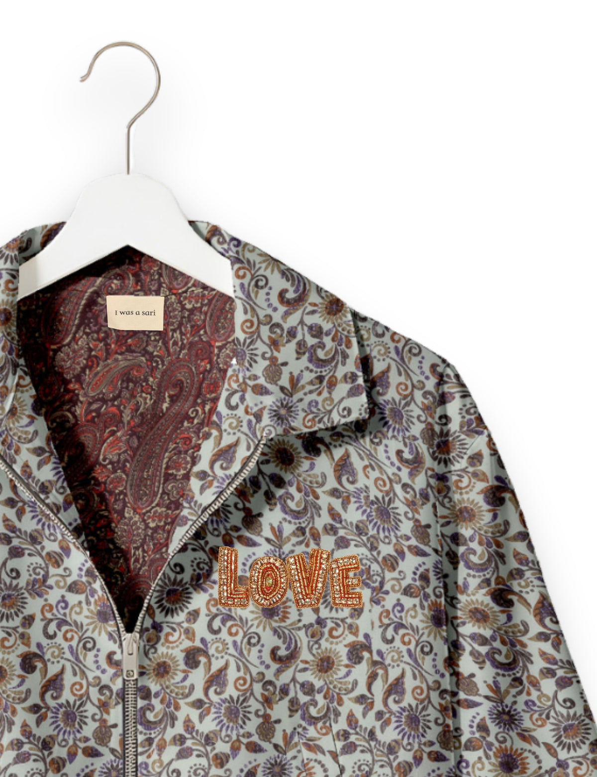Love Bomber Jacket made from recycled fabric, featuring hand-stitched Aari embroidery. A unique piece of zero-waste clothing, part of the circular fashion movement. Designed with upcycled materials for a stylish yet environmentally friendly clothing choice.