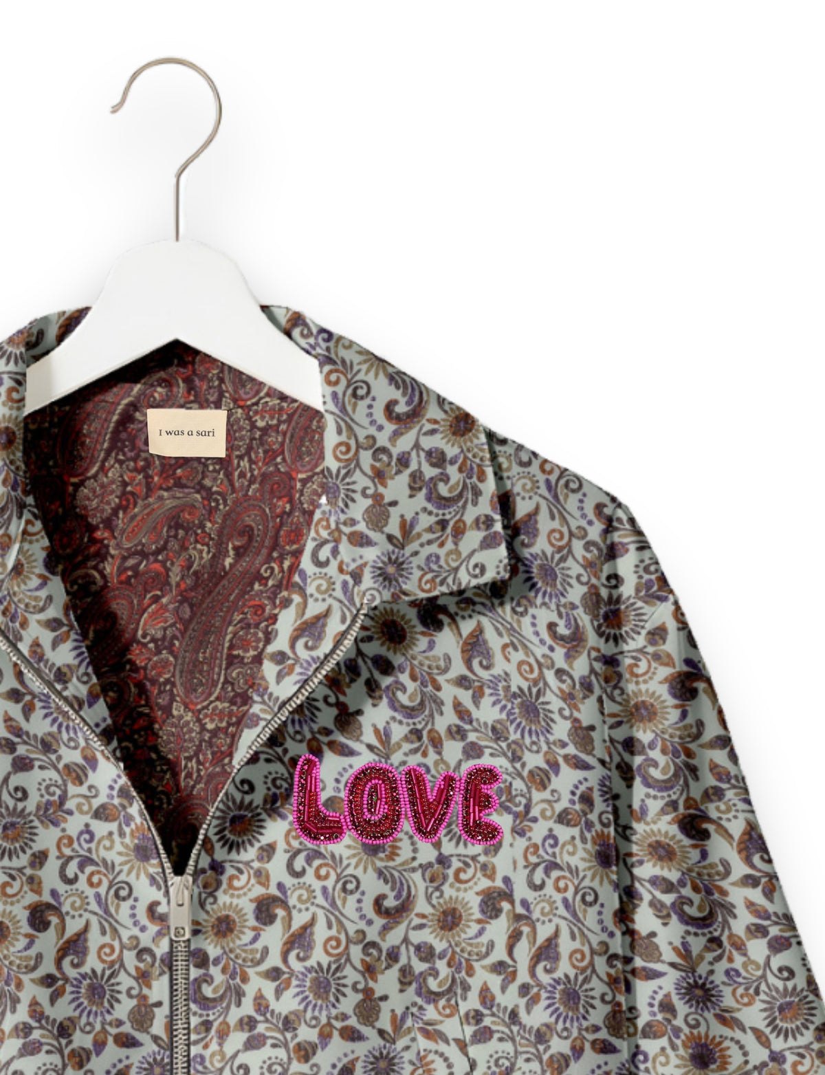Love Bomber Jacket made from recycled fabric, featuring hand-stitched Aari embroidery. A unique piece of zero-waste clothing, part of the circular fashion movement. Designed with upcycled materials for a stylish yet environmentally friendly clothing choice.