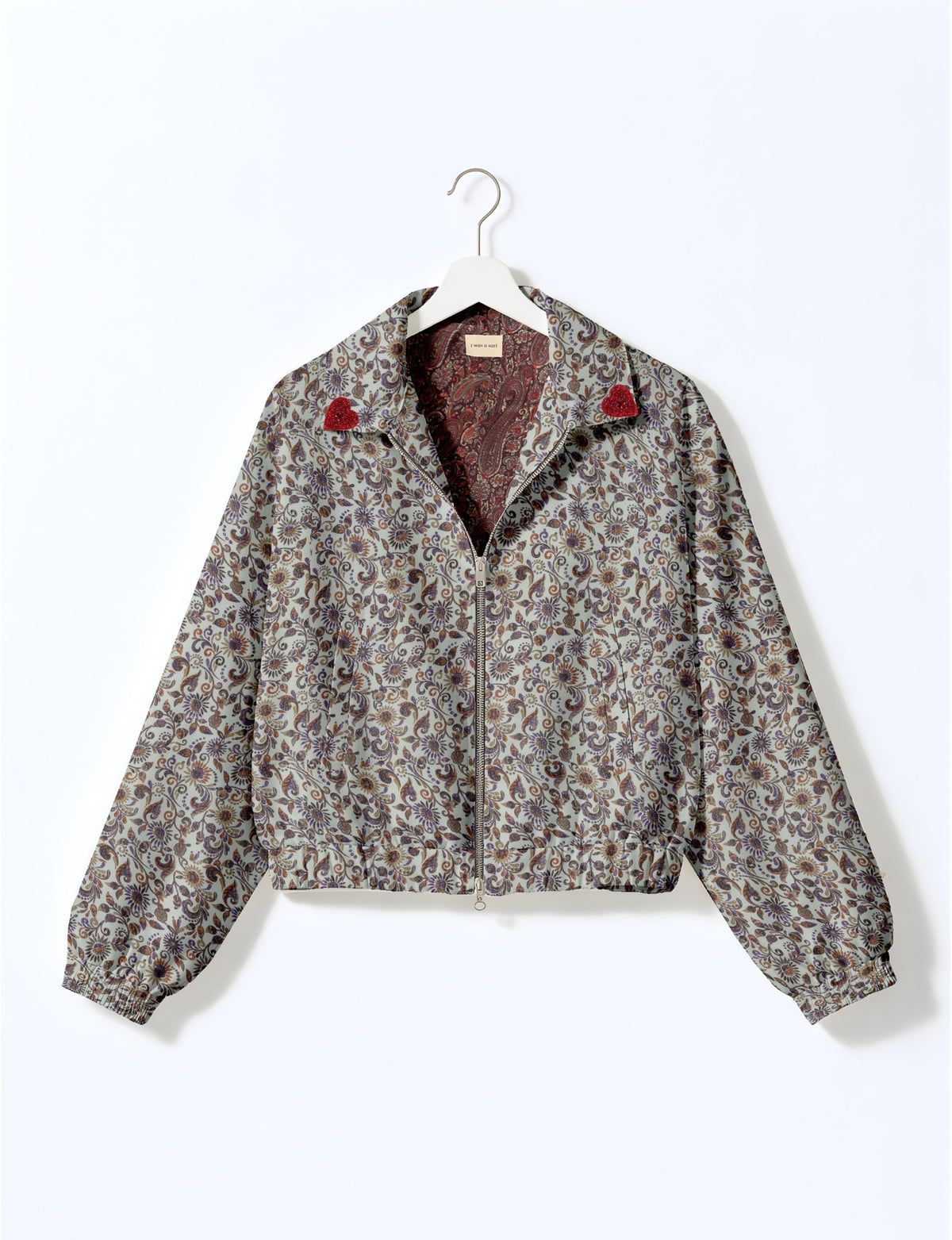 Love Bomber Jacket made from recycled fabric, featuring hand-stitched Aari embroidery. A unique piece of zero-waste clothing, part of the circular fashion movement. Designed with upcycled materials for a stylish yet environmentally friendly clothing choice.