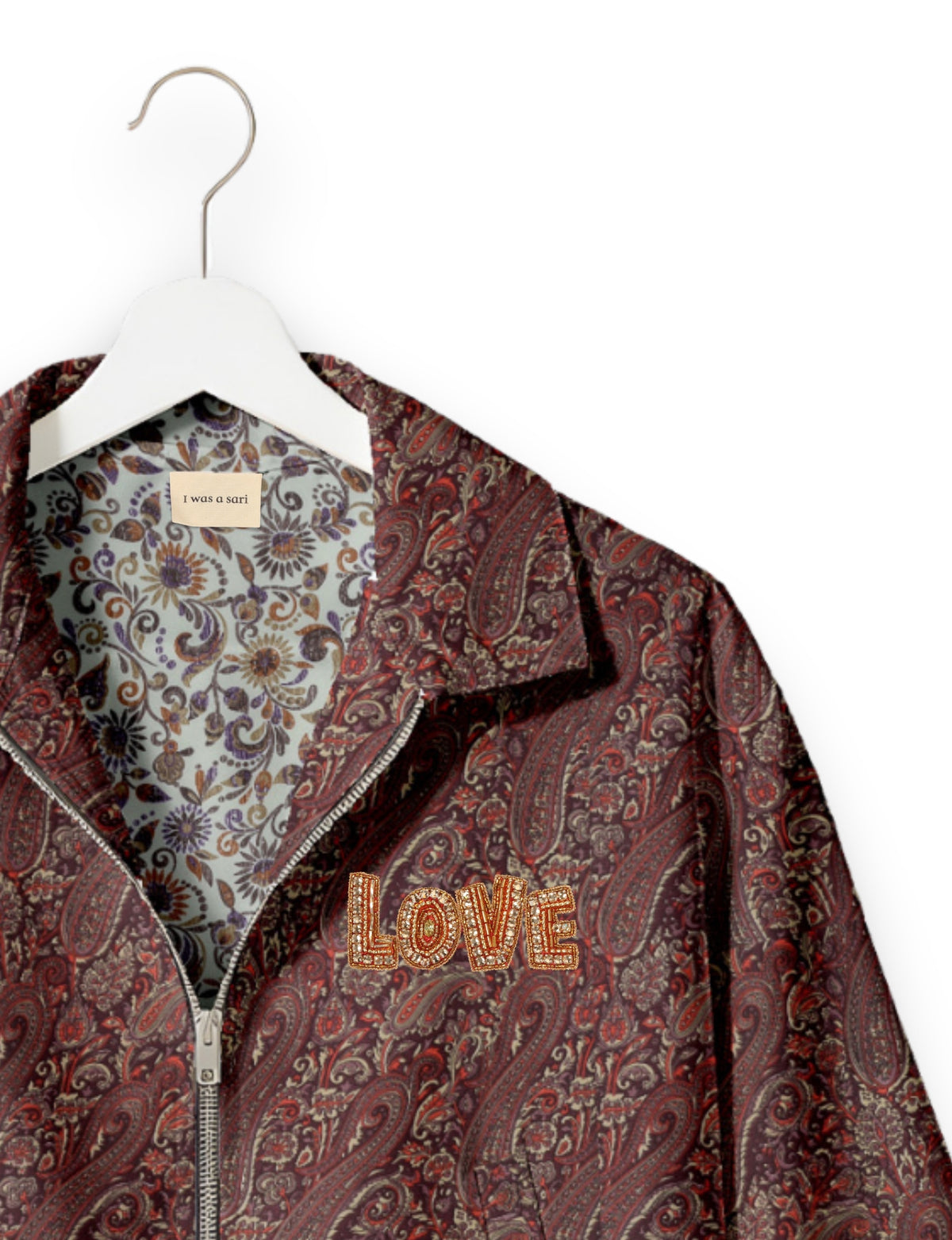 Love Bomber Jacket made from recycled fabric, featuring hand-stitched Aari embroidery. A unique piece of zero-waste clothing, part of the circular fashion movement. Designed with upcycled materials for a stylish yet environmentally friendly clothing choice.