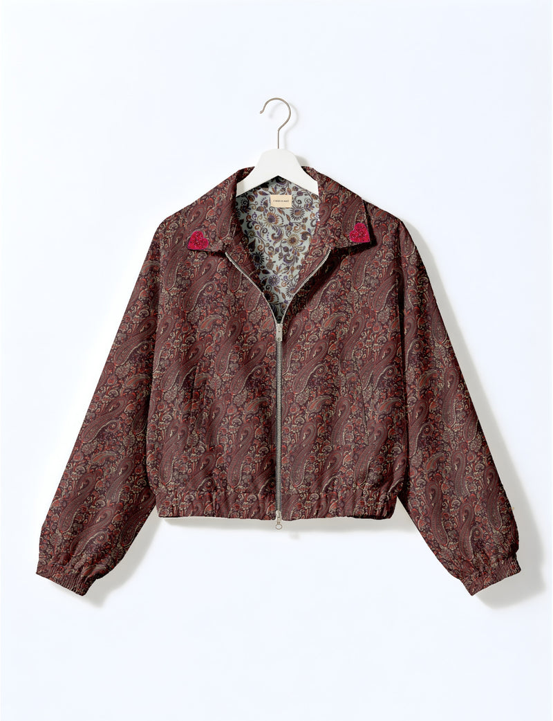 Love Bomber Jacket made from recycled fabric, featuring hand-stitched Aari embroidery. A unique piece of zero-waste clothing, part of the circular fashion movement. Designed with upcycled materials for a stylish yet environmentally friendly clothing choice.