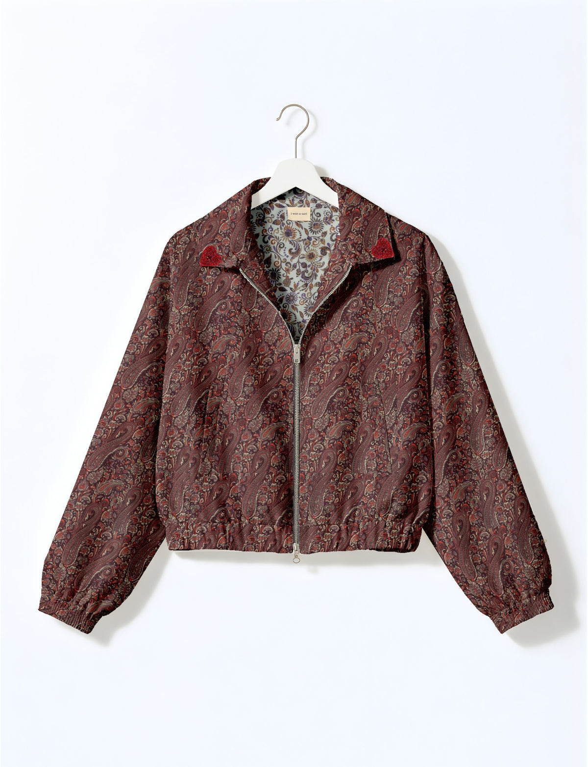 Love Bomber Jacket made from recycled fabric, featuring hand-stitched Aari embroidery. A unique piece of zero-waste clothing, part of the circular fashion movement. Designed with upcycled materials for a stylish yet environmentally friendly clothing choice.