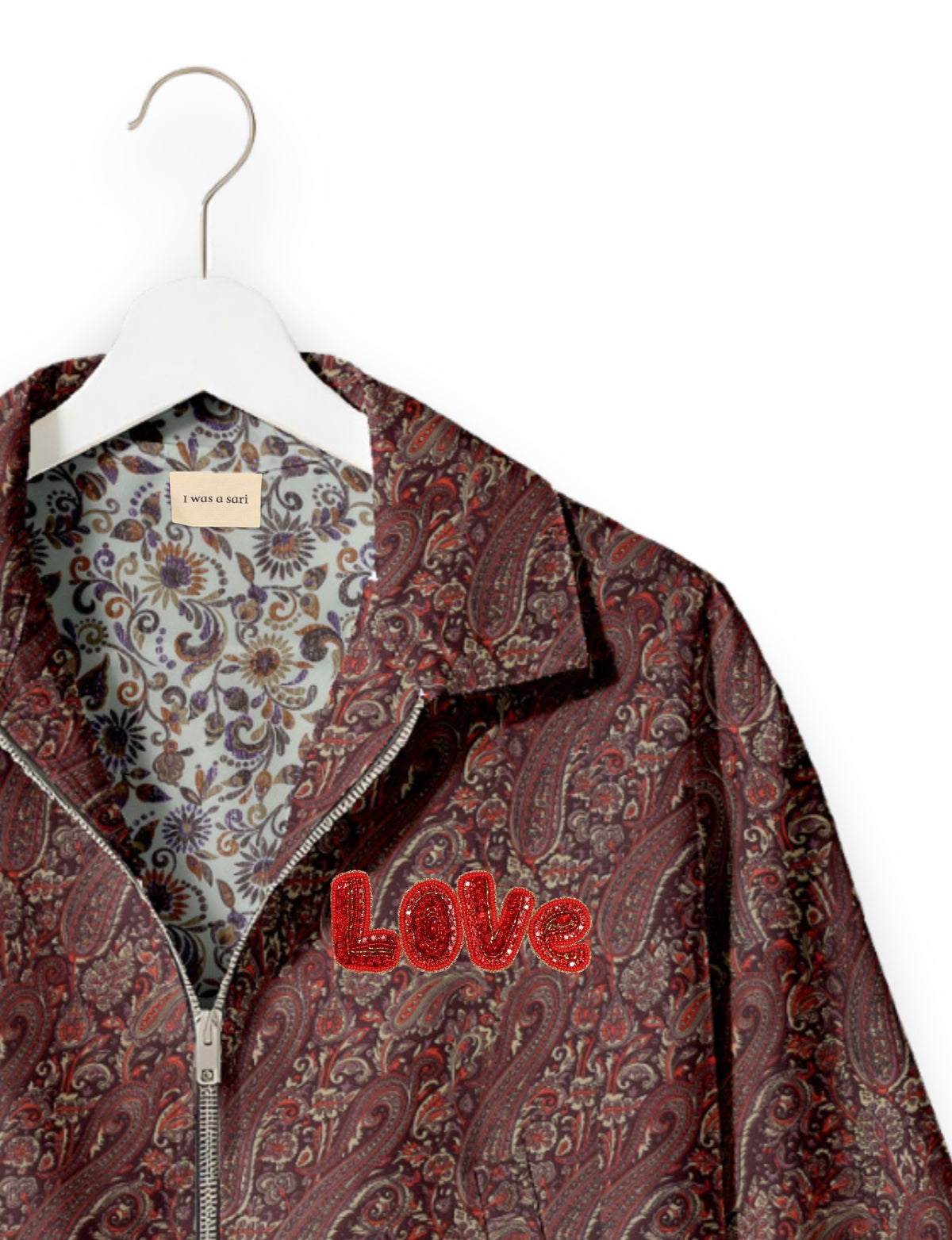 Love Bomber Jacket made from recycled fabric, featuring hand-stitched Aari embroidery. A unique piece of zero-waste clothing, part of the circular fashion movement. Designed with upcycled materials for a stylish yet environmentally friendly clothing choice.
