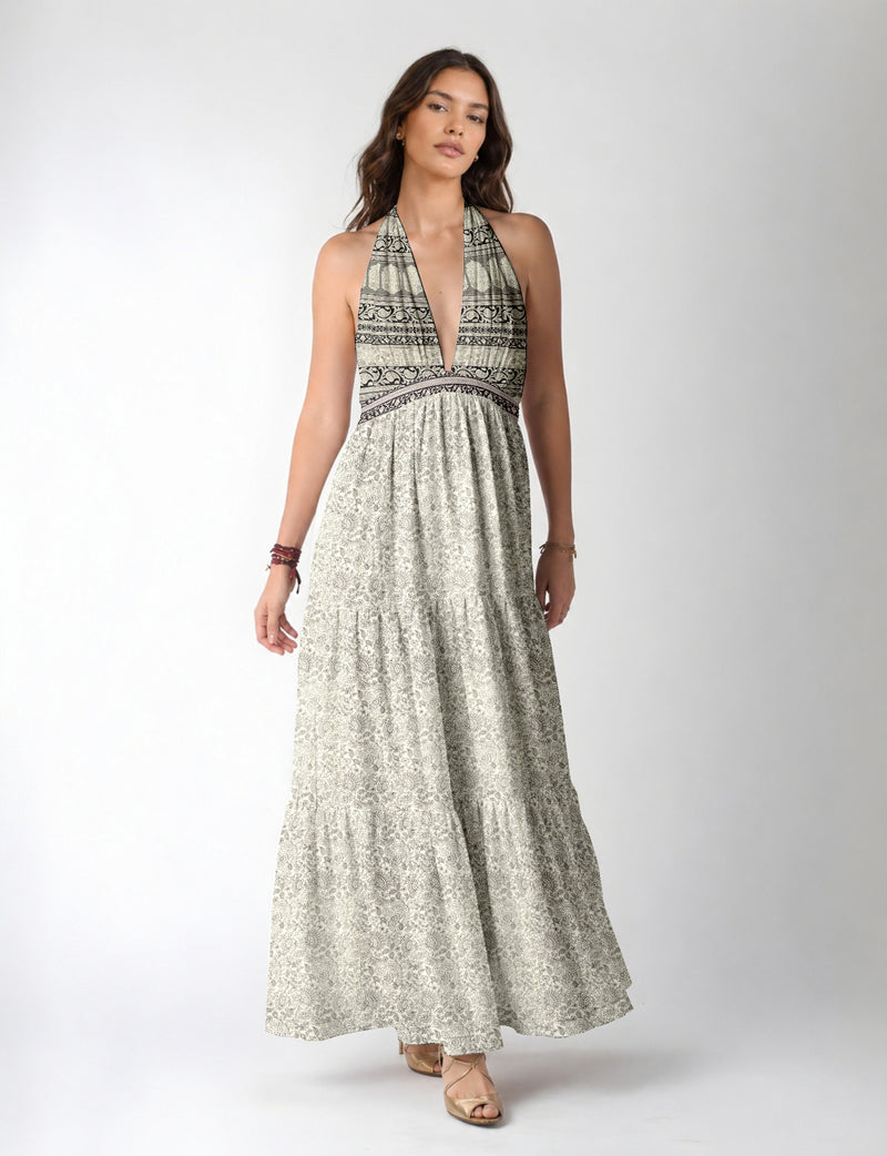 Maxi tiered dress by I was a Sari with halter neckline and flowy silhouette