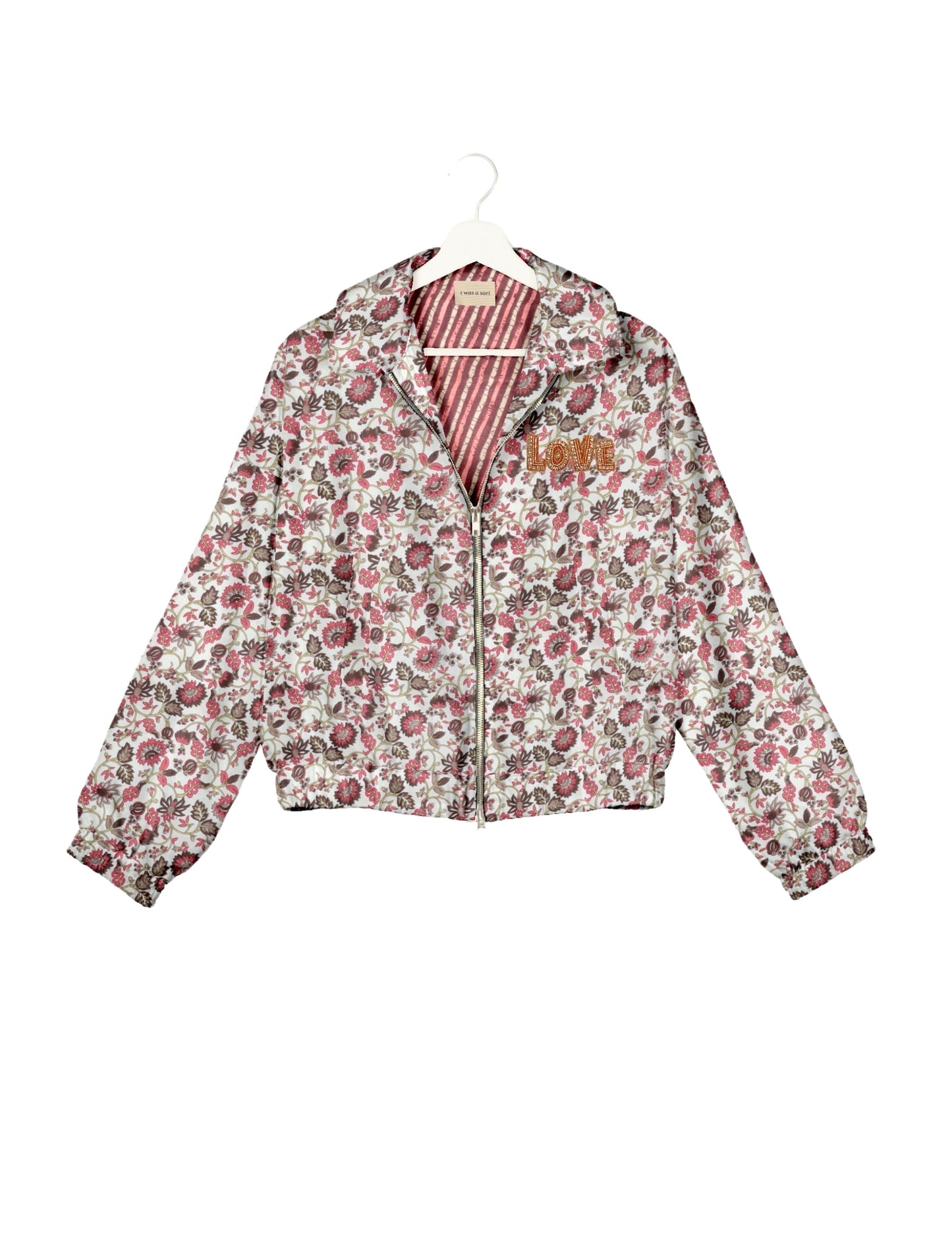 Love Bomber Jacket made from recycled fabric, featuring hand-stitched Aari embroidery. A unique piece of zero-waste clothing, part of the circular fashion movement. Designed with upcycled materials for a stylish yet environmentally friendly clothing choice.