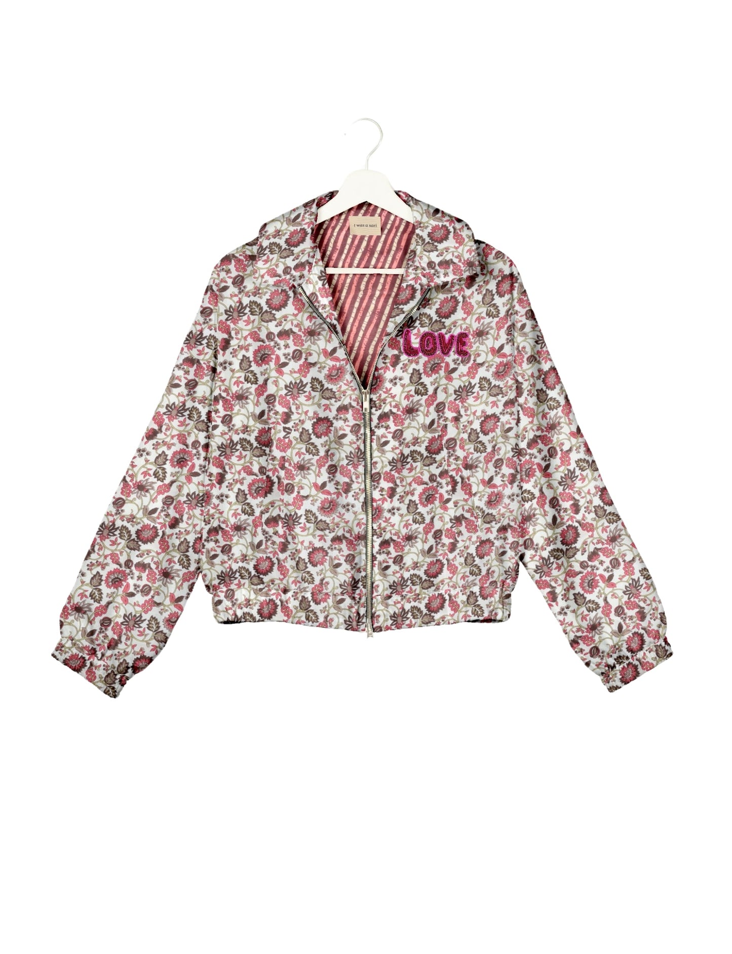 Love Bomber Jacket made from recycled fabric, featuring hand-stitched Aari embroidery. A unique piece of zero-waste clothing, part of the circular fashion movement. Designed with upcycled materials for a stylish yet environmentally friendly clothing choice.