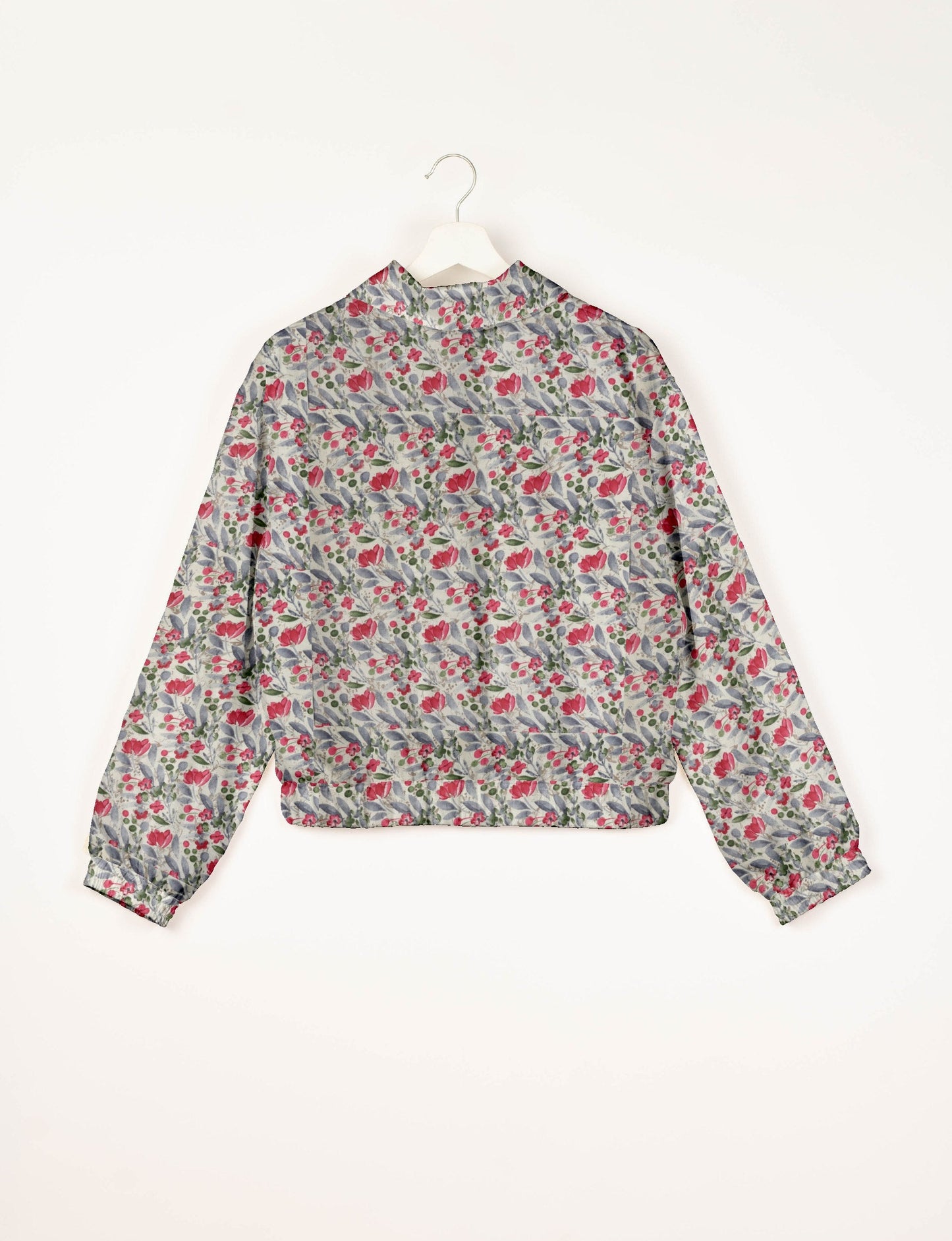 Upcycled Bomber Jacket made from recycled sari materials, featuring a cute cropped shape, elasticated hem and cuffs, and contrast sari print lining. Sustainable apparel promoting eco-friendly fashion and ethical clothing.