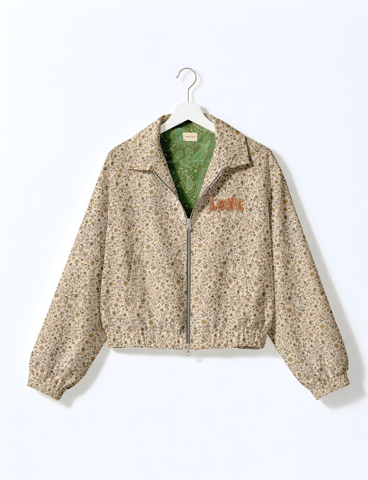 Love Bomber Jacket made from recycled fabric, featuring hand-stitched Aari embroidery. A unique piece of zero-waste clothing, part of the circular fashion movement. Designed with upcycled materials for a stylish yet environmentally friendly clothing choice.