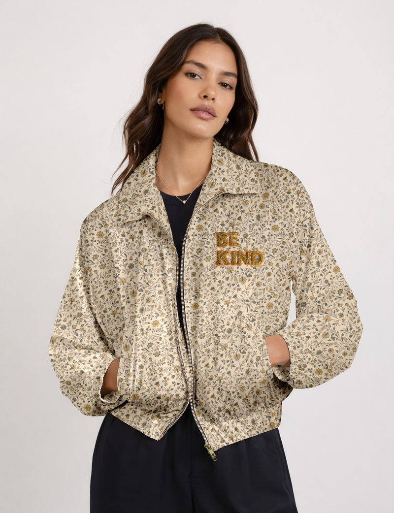 BE KIND Bomber jacket made from upcycled sari fabric with handcrafted Aari embroidery by female artisans.