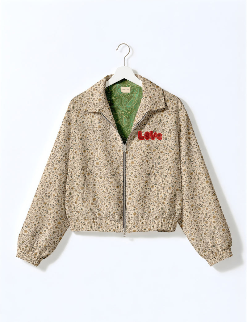 Love Bomber Jacket made from recycled fabric, featuring hand-stitched Aari embroidery. A unique piece of zero-waste clothing, part of the circular fashion movement. Designed with upcycled materials for a stylish yet environmentally friendly clothing choice.