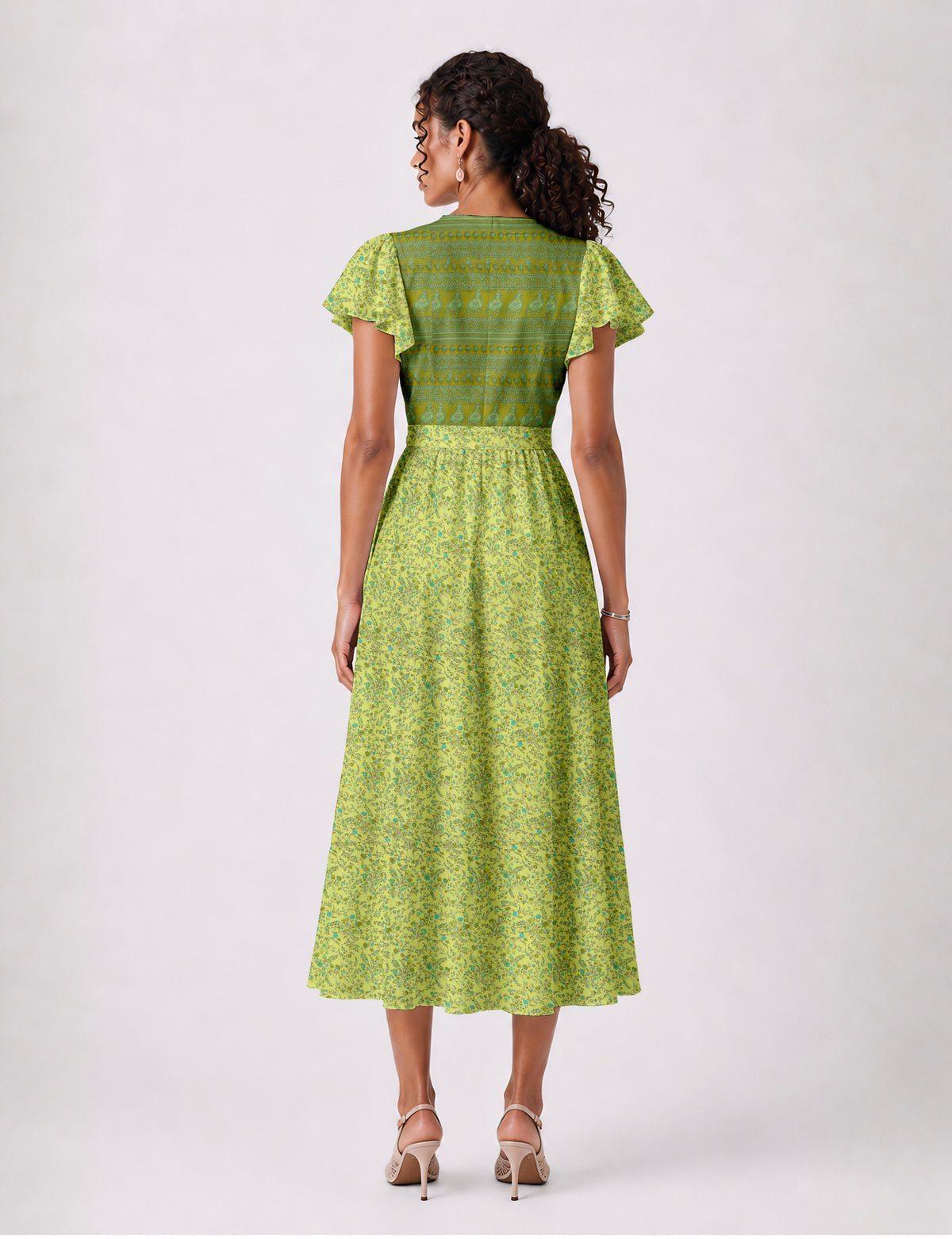 Elegant midi wrap dress with a V-neckline, adjustable waist tie, fitted bodice, and flared skirt for a timeless, flattering silhouette.