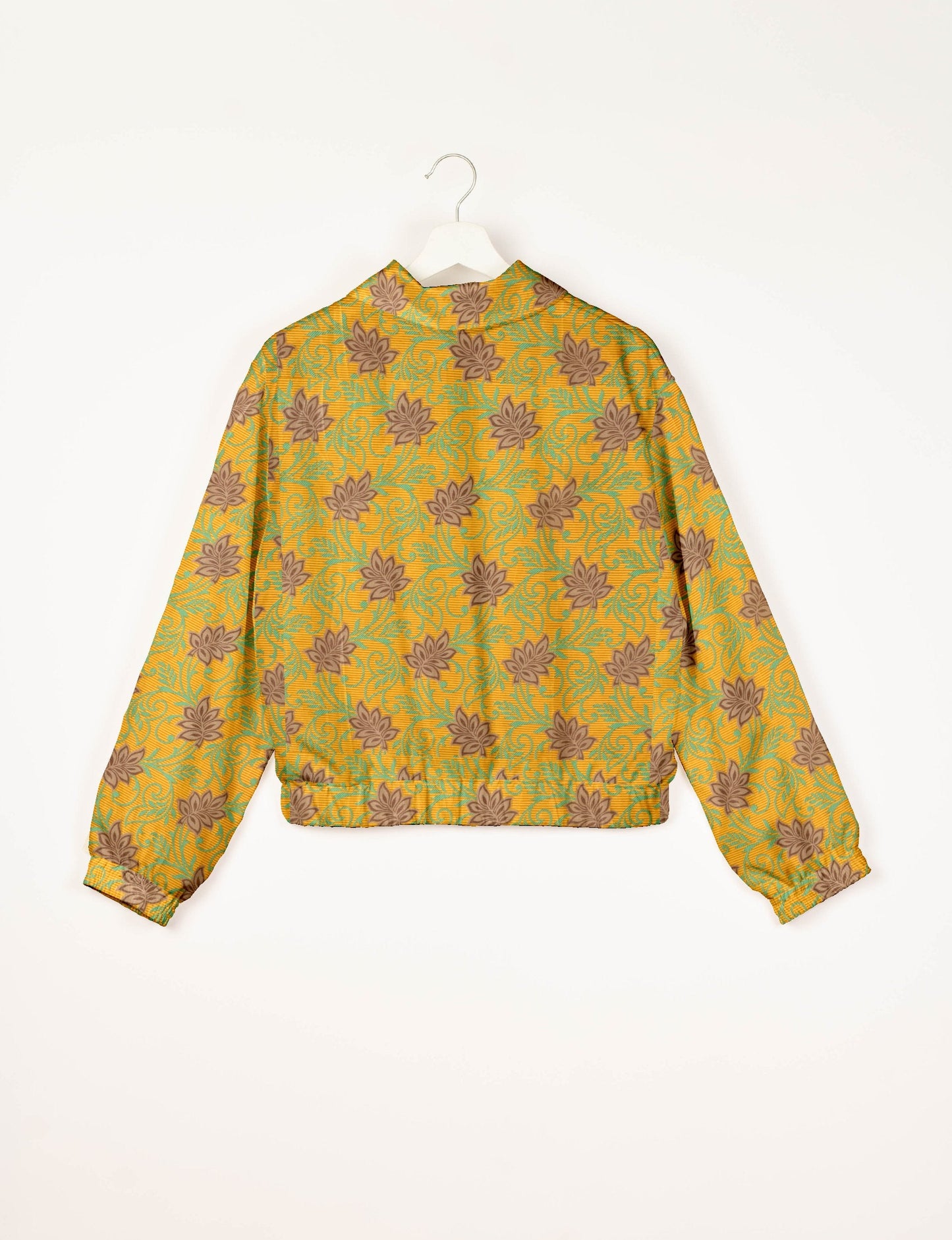 Stylish BOMBER JACKET, an upcycled clothing masterpiece with a cute cropped shape, elasticated details, and detachable metallic zipper. Contrast sari print lining adds a unique touch. Explore sustainable and eco-friendly fashion.