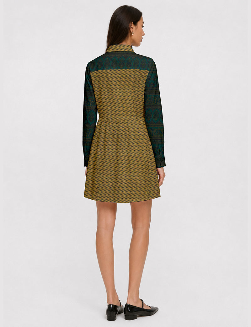 Short shirt dress with a relaxed A-line silhouette, point collar, partial button placket, gathered waist, side pockets, and full-length cuffed sleeves.