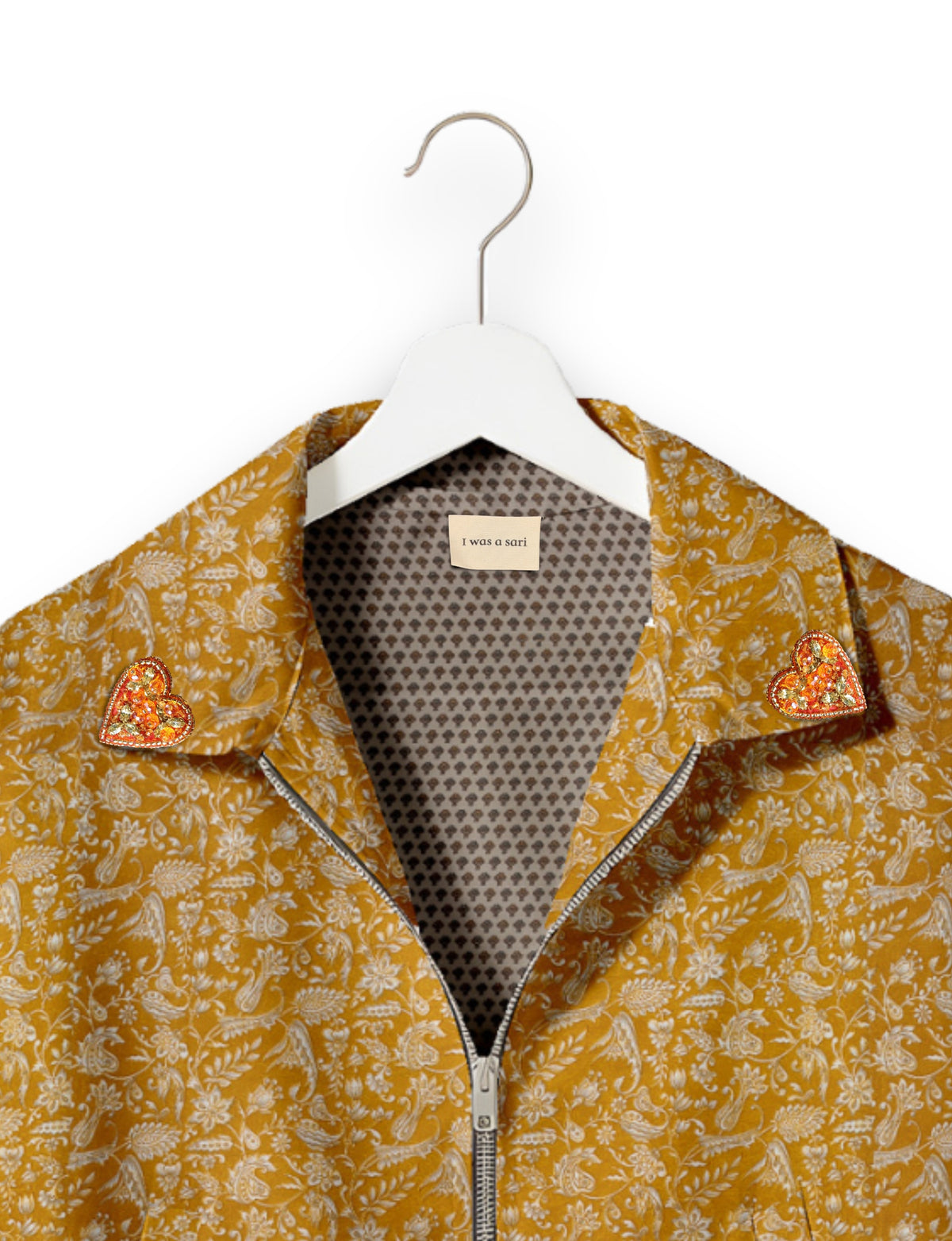 Love Bomber Jacket made from recycled fabric, featuring hand-stitched Aari embroidery. A unique piece of zero-waste clothing, part of the circular fashion movement. Designed with upcycled materials for a stylish yet environmentally friendly clothing choice.