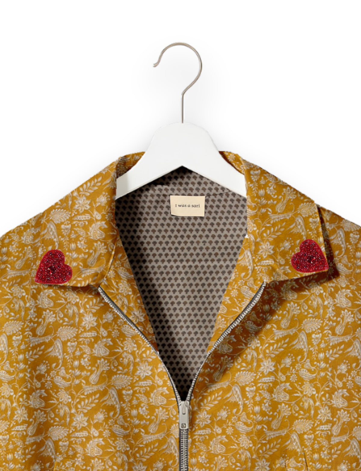 Love Bomber Jacket made from recycled fabric, featuring hand-stitched Aari embroidery. A unique piece of zero-waste clothing, part of the circular fashion movement. Designed with upcycled materials for a stylish yet environmentally friendly clothing choice.