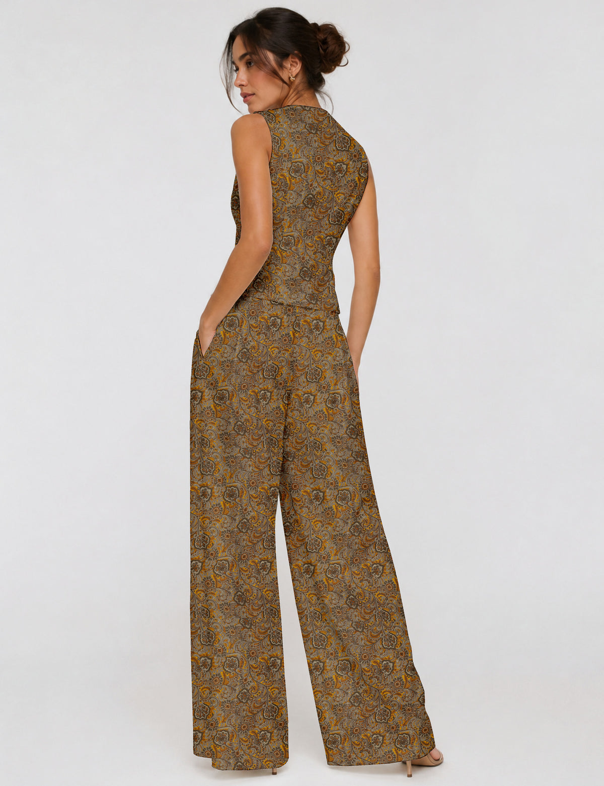 Women's tailored waistcoat set with a sleeveless V-neck button-front waistcoat and high-rise wide leg trousers in a coordinated matching outfit.