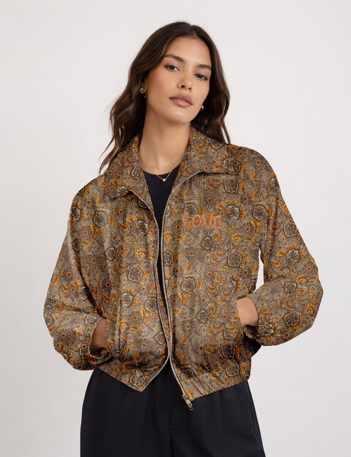 Love Bomber Jacket made from recycled fabric, featuring hand-stitched Aari embroidery. A unique piece of zero-waste clothing, part of the circular fashion movement. Designed with upcycled materials for a stylish yet environmentally friendly clothing choice.