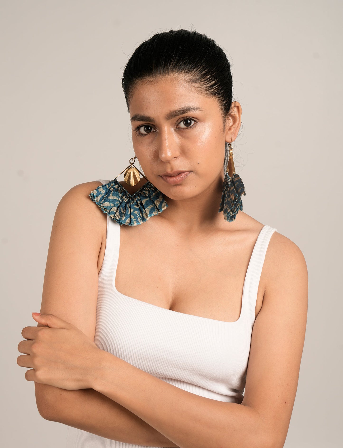 Bold and distinctive MAXI SQUARE EARRINGS – dramatic accessories with fabric frill, metallic charm, and a raw edge. Hypoallergy tested, skin-friendly metal hooks make these earrings unique and glamorous. Elevate your style with these eye-catching, nickel, and lead-free accessories.