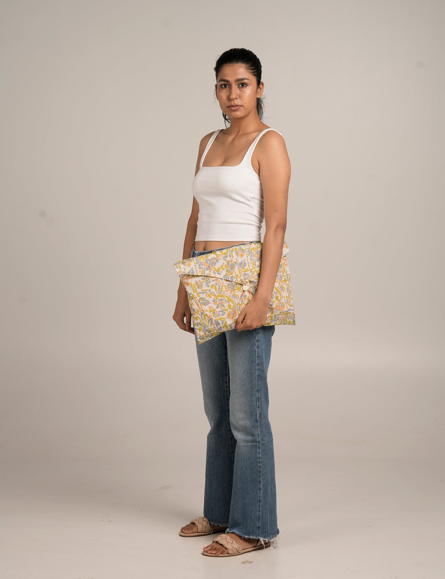 Explore our Travel Set, a stylish solution for organizing tech accessories, chargers, jewelry, and small items. Crafted from upcycled materials, these pouches embody ethical fashion and sustainability, making your travels both chic and eco-friendly.