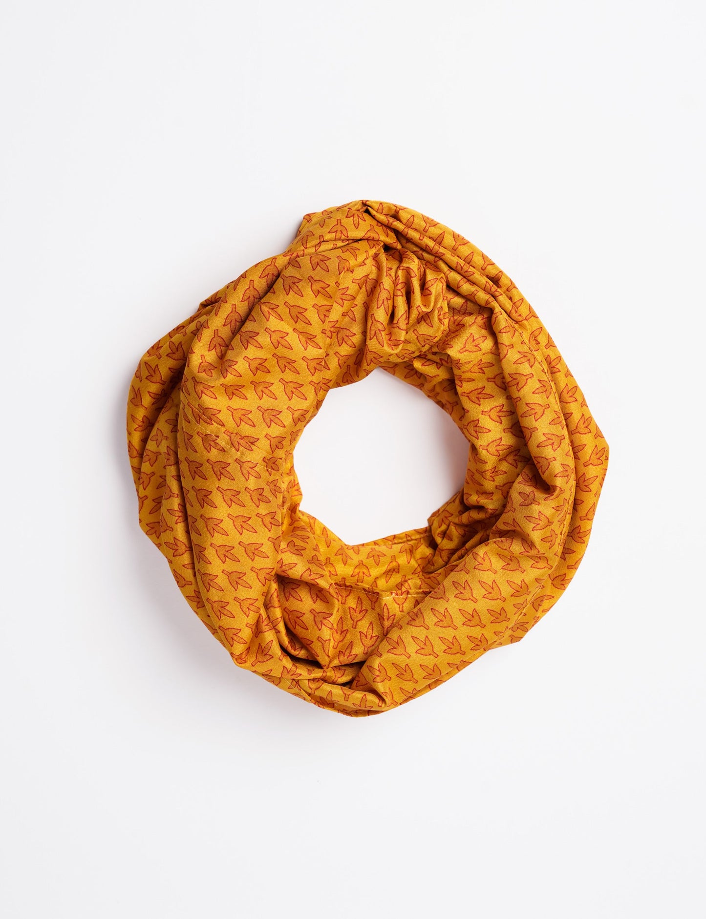 Sustainable style embraces you with our LOOP SCARF – an infinity-style scarf crafted from vibrant, pattern-rich saris. Handcrafted by experienced Mumbai-based artisans, this versatile scarf can be worn looped once or twice around your neck or as a head-wrap. From laid-back beach vacations to dress-to-impress dinners, this scarf is a timeless accessory.