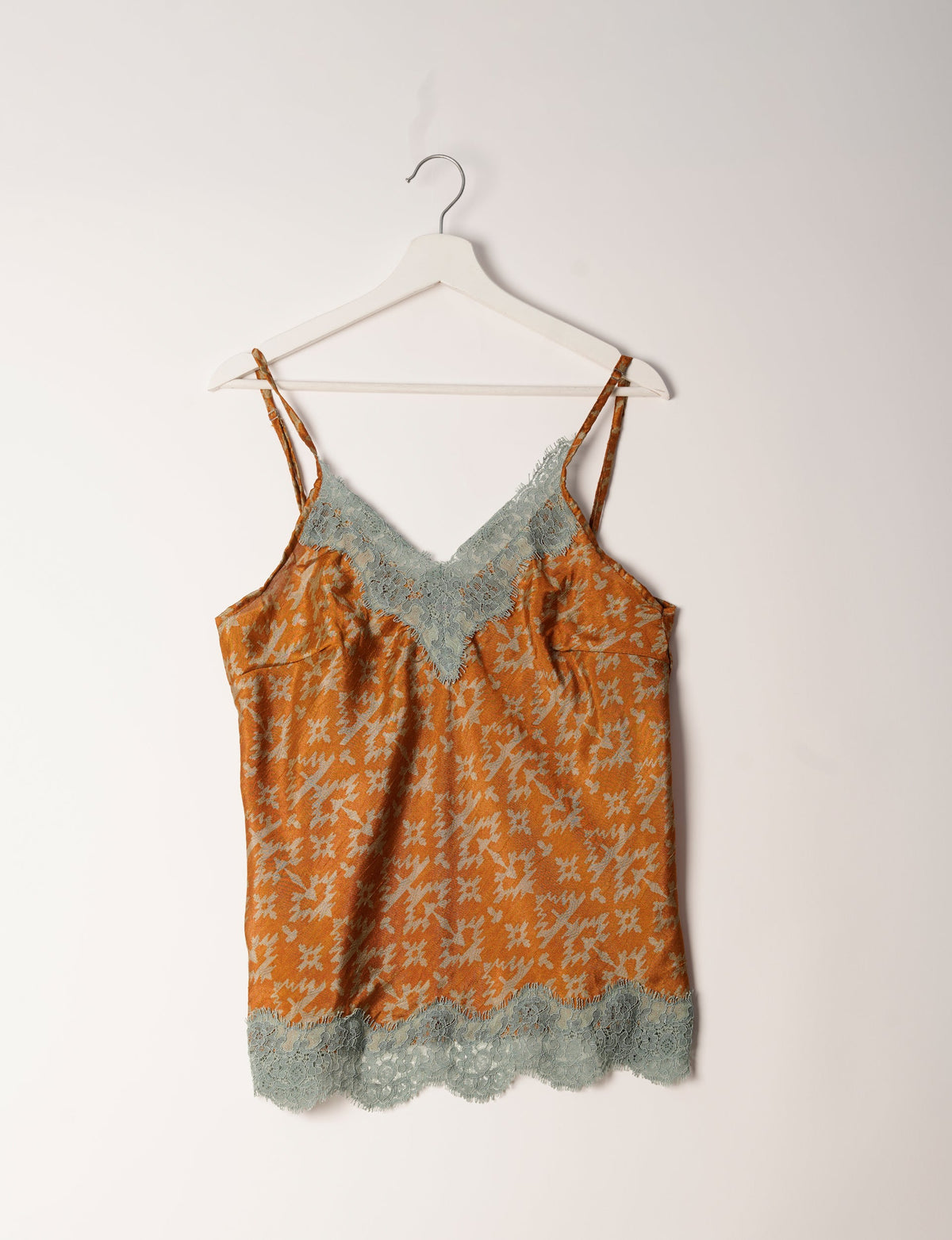 Sleep in eco-friendly luxury with our PJ Set Short. Made for the conscious consumer, these pajamas contribute to zero waste and sustainable practices. The cami top, adorned with delicate eyelash lace and cut on the bias, pairs seamlessly with the comfy shorts featuring an elasticated waist and drawstring tie.