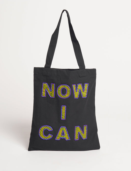 Discover empowerment with our NOW I CAN TOTE BAG – a distinctive piece from our embroidery collection, commemorating positive transformations in the lives of our women artisans. Each bag signifies empowerment, from community pride to supporting education dreams. Carefully crafted with embroidered signatures, these bags are not only visually appealing but also embody the artisans' journeys and the reincarnation of pre-loved saris into a new form – as your treasured bag.