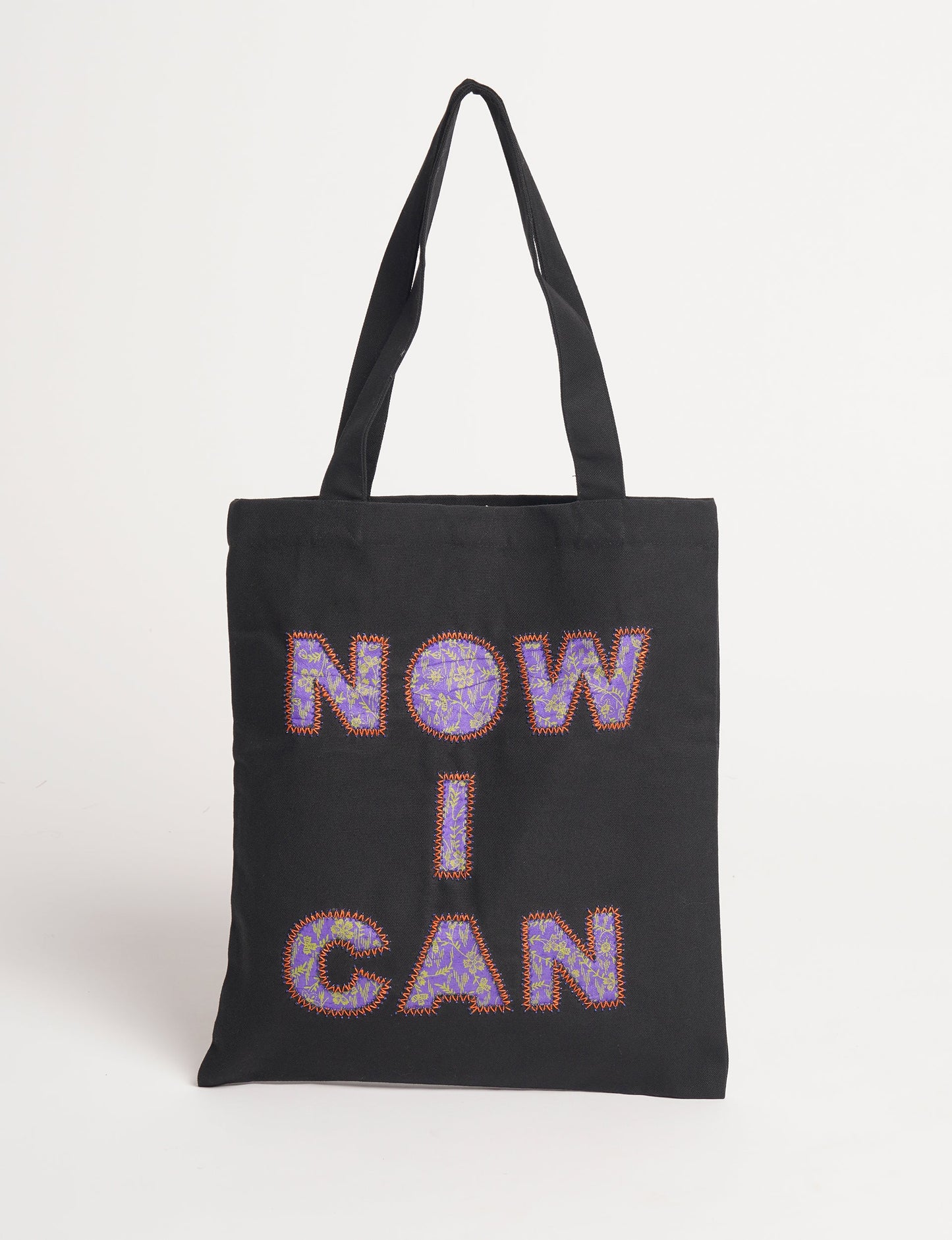 Discover empowerment with our NOW I CAN TOTE BAG – a distinctive piece from our embroidery collection, commemorating positive transformations in the lives of our women artisans. Each bag signifies empowerment, from community pride to supporting education dreams. Carefully crafted with embroidered signatures, these bags are not only visually appealing but also embody the artisans' journeys and the reincarnation of pre-loved saris into a new form – as your treasured bag.