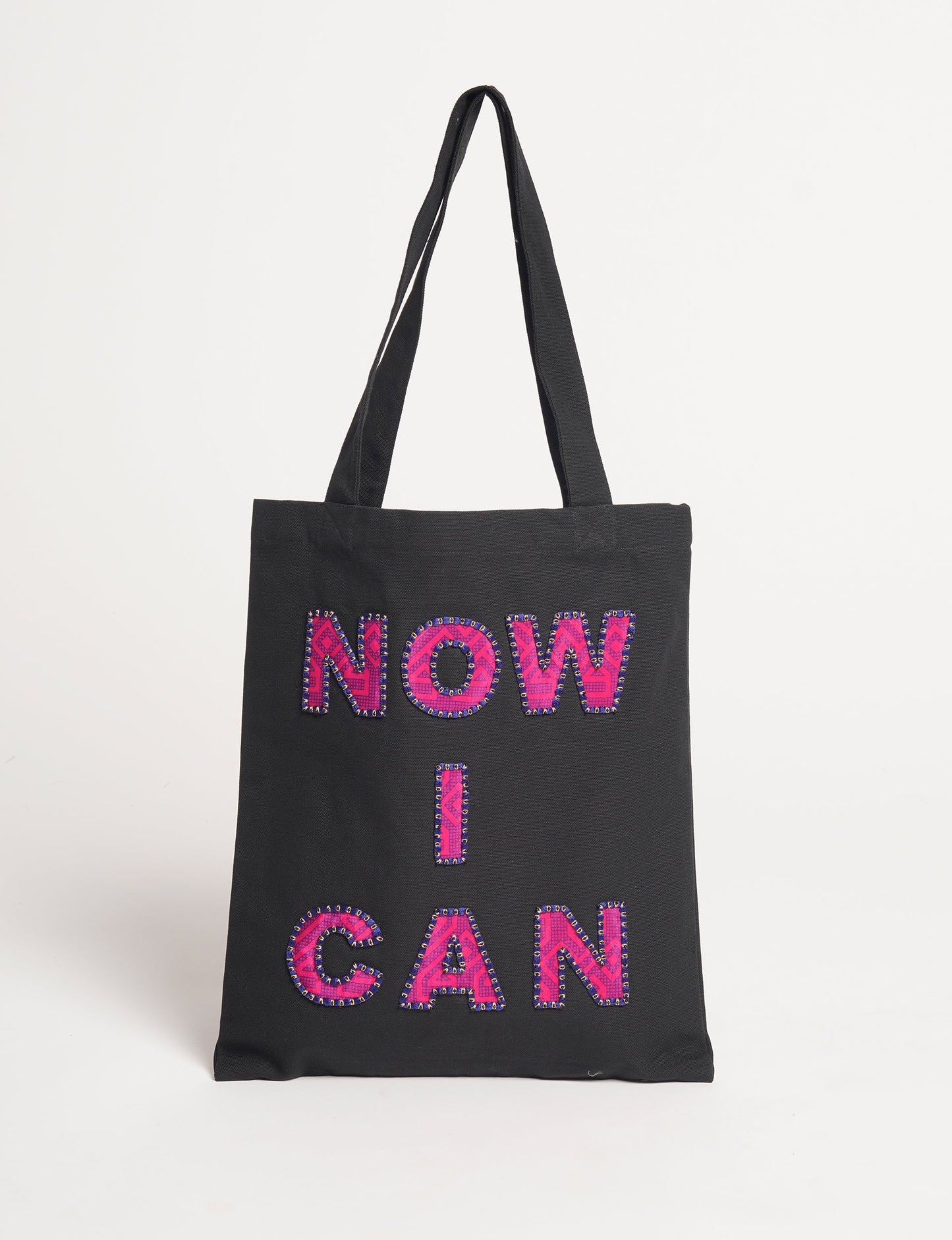 Discover empowerment with our NOW I CAN TOTE BAG – a distinctive piece from our embroidery collection, commemorating positive transformations in the lives of our women artisans. Each bag signifies empowerment, from community pride to supporting education dreams. Carefully crafted with embroidered signatures, these bags are not only visually appealing but also embody the artisans' journeys and the reincarnation of pre-loved saris into a new form – as your treasured bag.