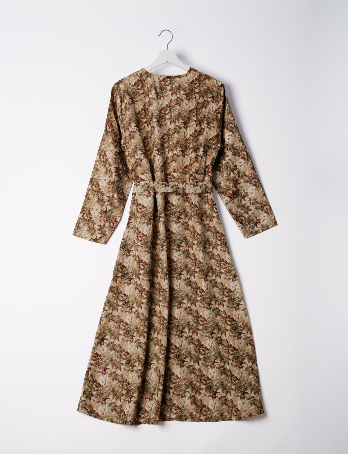 Brown abstract patterned long-sleeve beach robe with belt, shown from back on white hanger against white background
