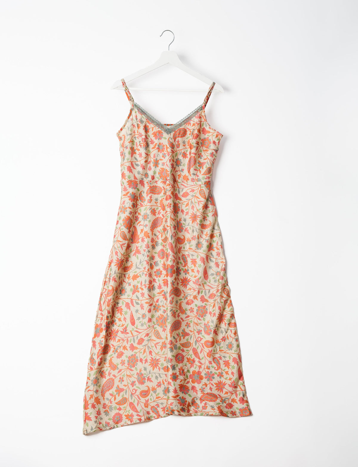 Spaghetti strap dress made from sustainable materials, embodying ethical fashion principles. Ideal for eco-friendly travelers seeking laid-back style.