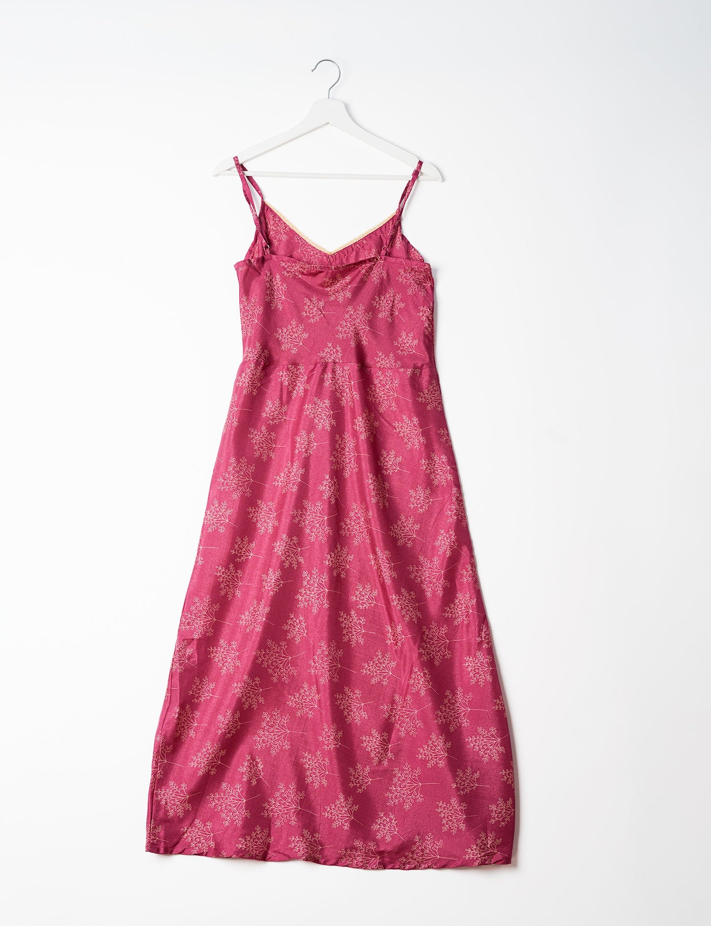 Spaghetti strap dress made from sustainable materials, embodying ethical fashion principles. Ideal for eco-friendly travelers seeking laid-back style.