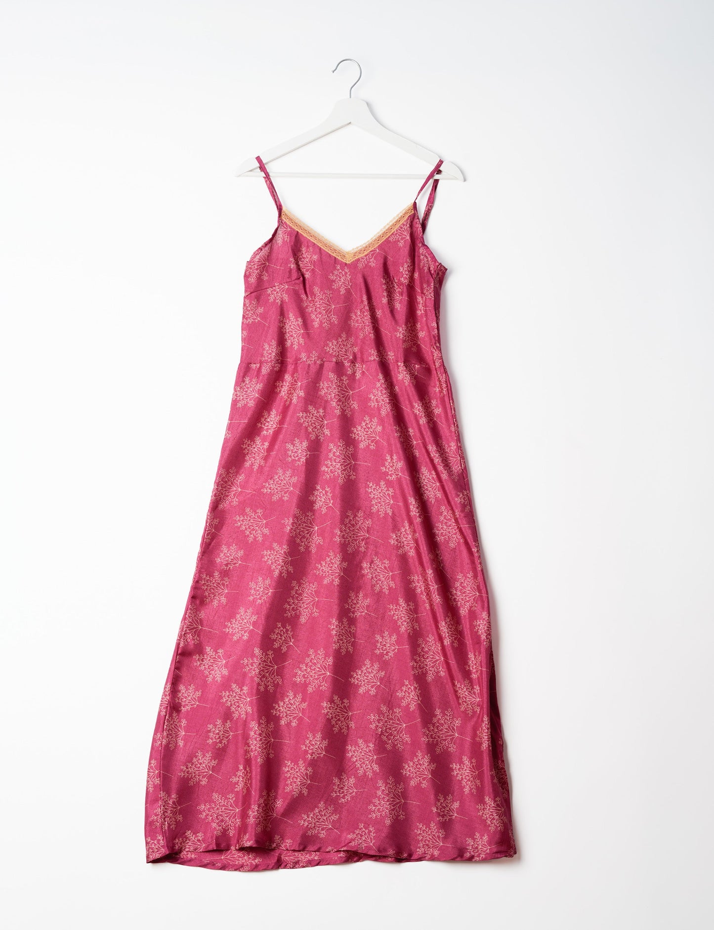 Spaghetti strap dress made from sustainable materials, embodying ethical fashion principles. Ideal for eco-friendly travelers seeking laid-back style.