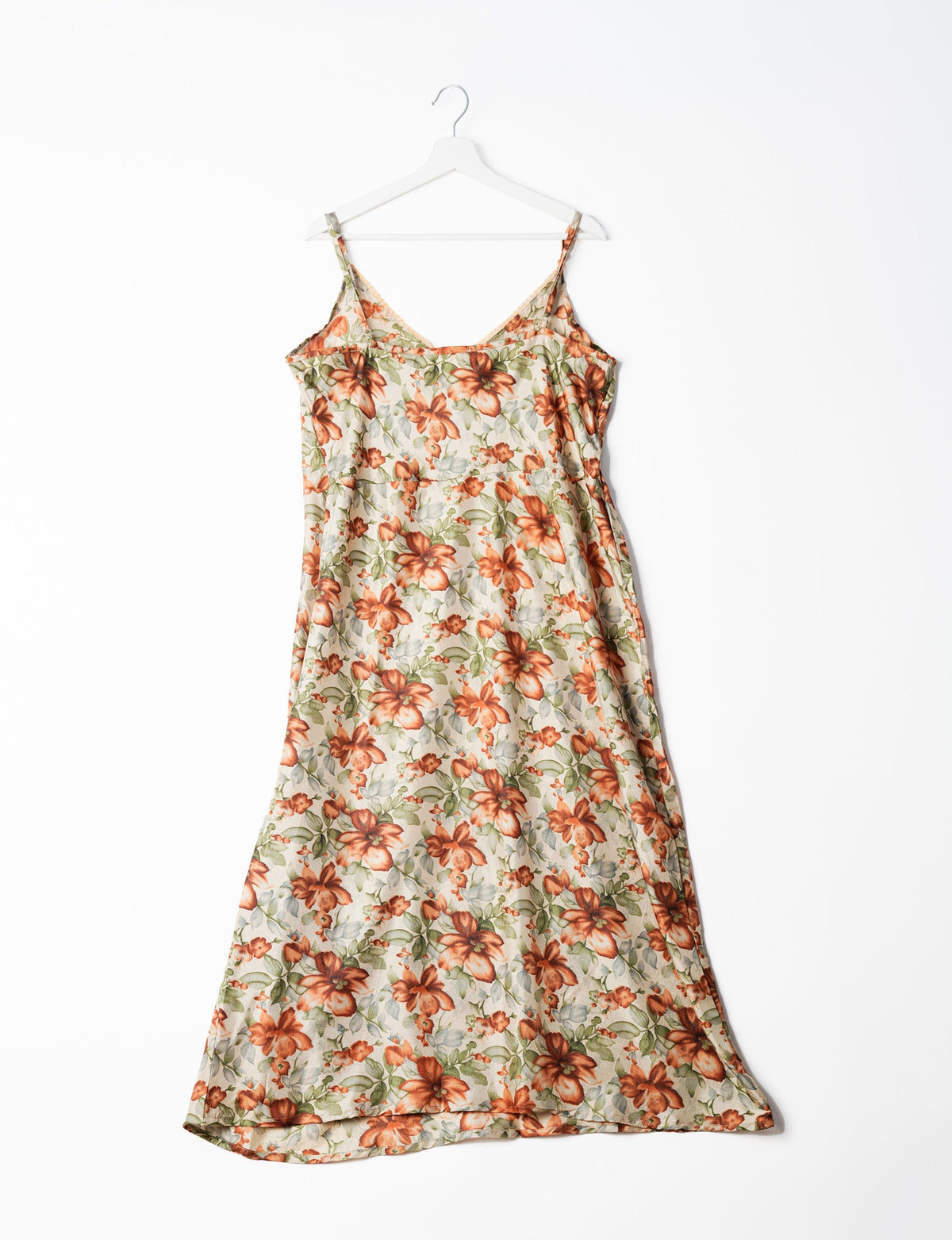 Spaghetti strap dress made from sustainable materials, embodying ethical fashion principles. Ideal for eco-friendly travelers seeking laid-back style.