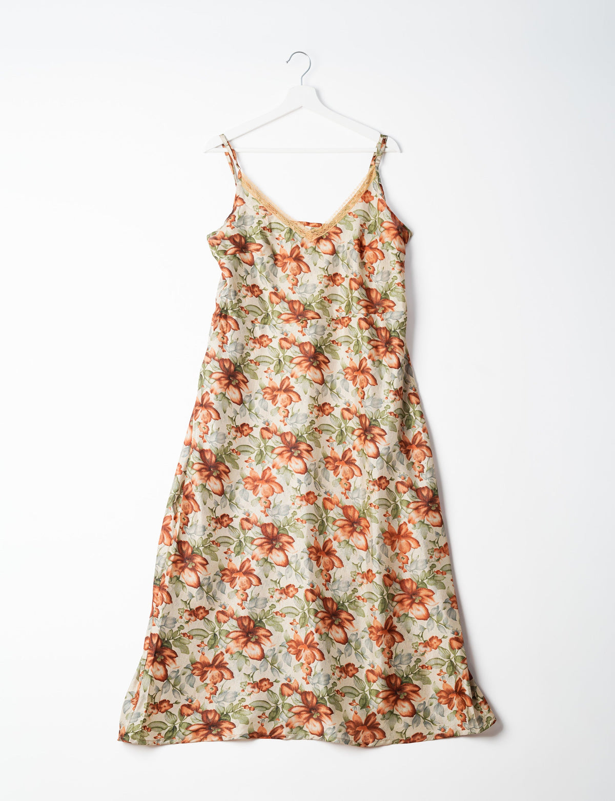 Spaghetti strap dress made from sustainable materials, embodying ethical fashion principles. Ideal for eco-friendly travelers seeking laid-back style.