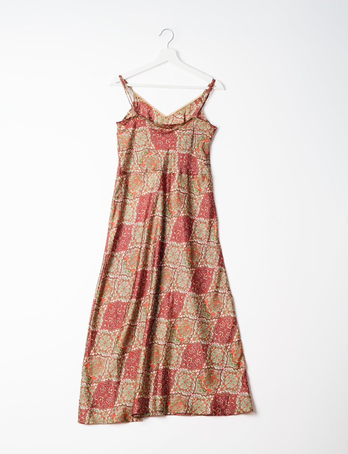 Spaghetti strap dress made from sustainable materials, embodying ethical fashion principles. Ideal for eco-friendly travelers seeking laid-back style.