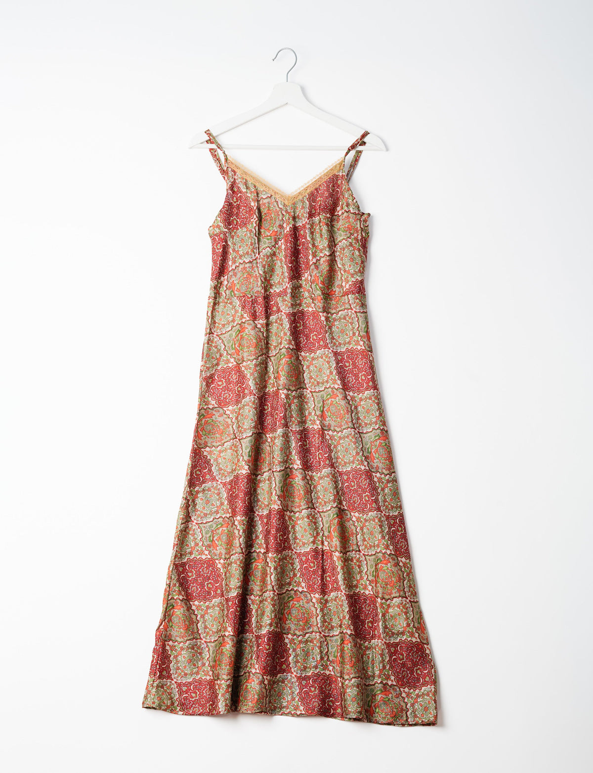 Spaghetti strap dress made from sustainable materials, embodying ethical fashion principles. Ideal for eco-friendly travelers seeking laid-back style.