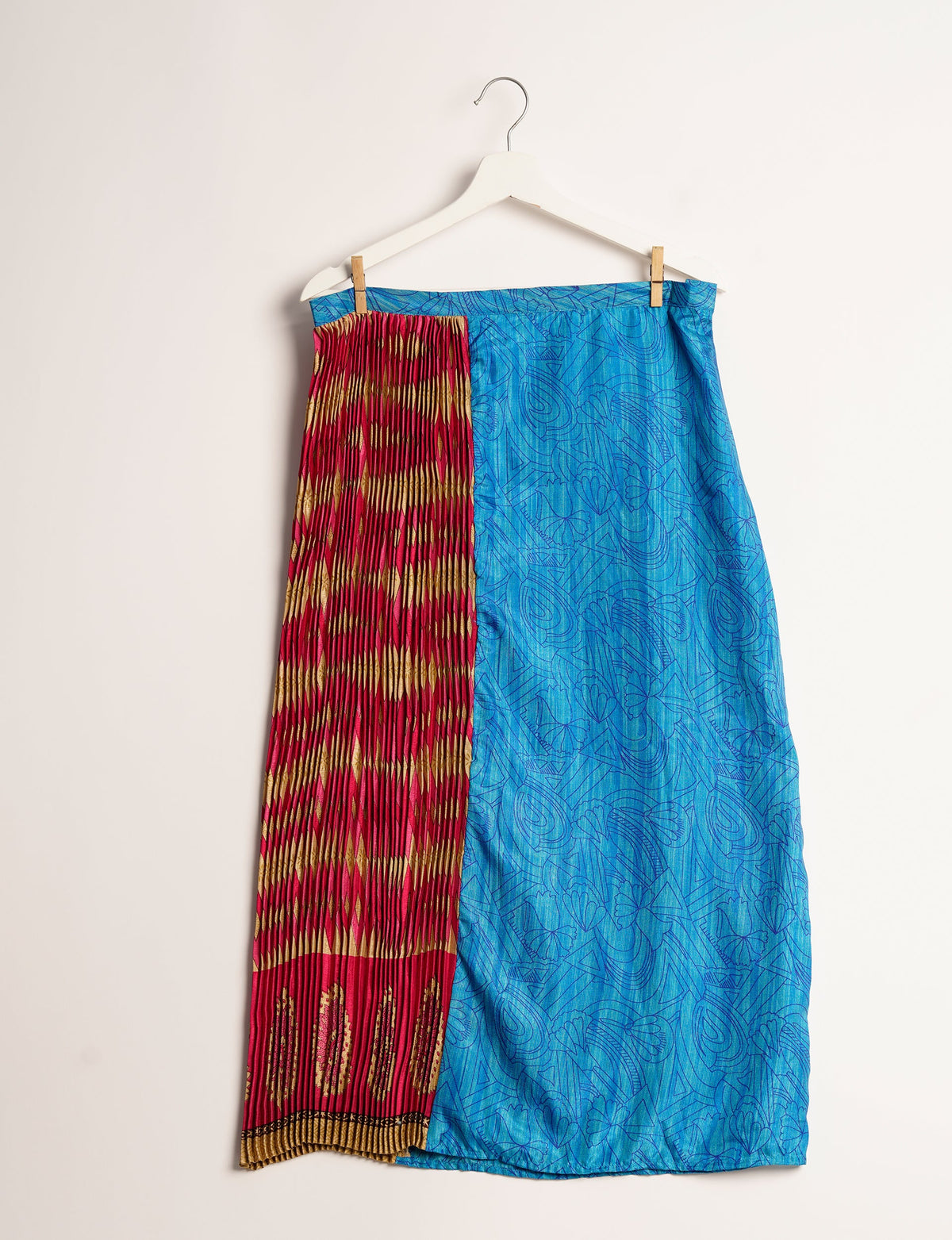 Elevate your wardrobe with the Semi Pleated A-Line Skirt, a sustainable fashion statement. Unique prints, a mix of fabrics, and intricate knife pleats create an individualized, upscale day-to-night look. Crafted with ethical and green fashion values, this skirt represents the essence of eco-friendly style.